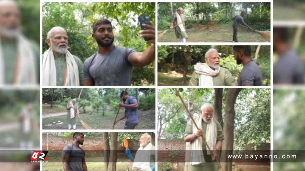 ঝাঁটা হাতে ময়লা সাফ করছে প্রধানমন্ত্রী মোদি